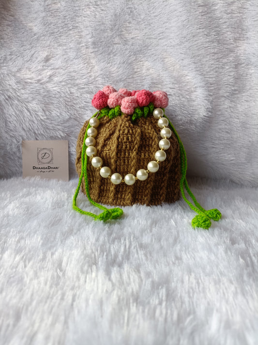 The ' Blooming Garden ' Crochet Potli