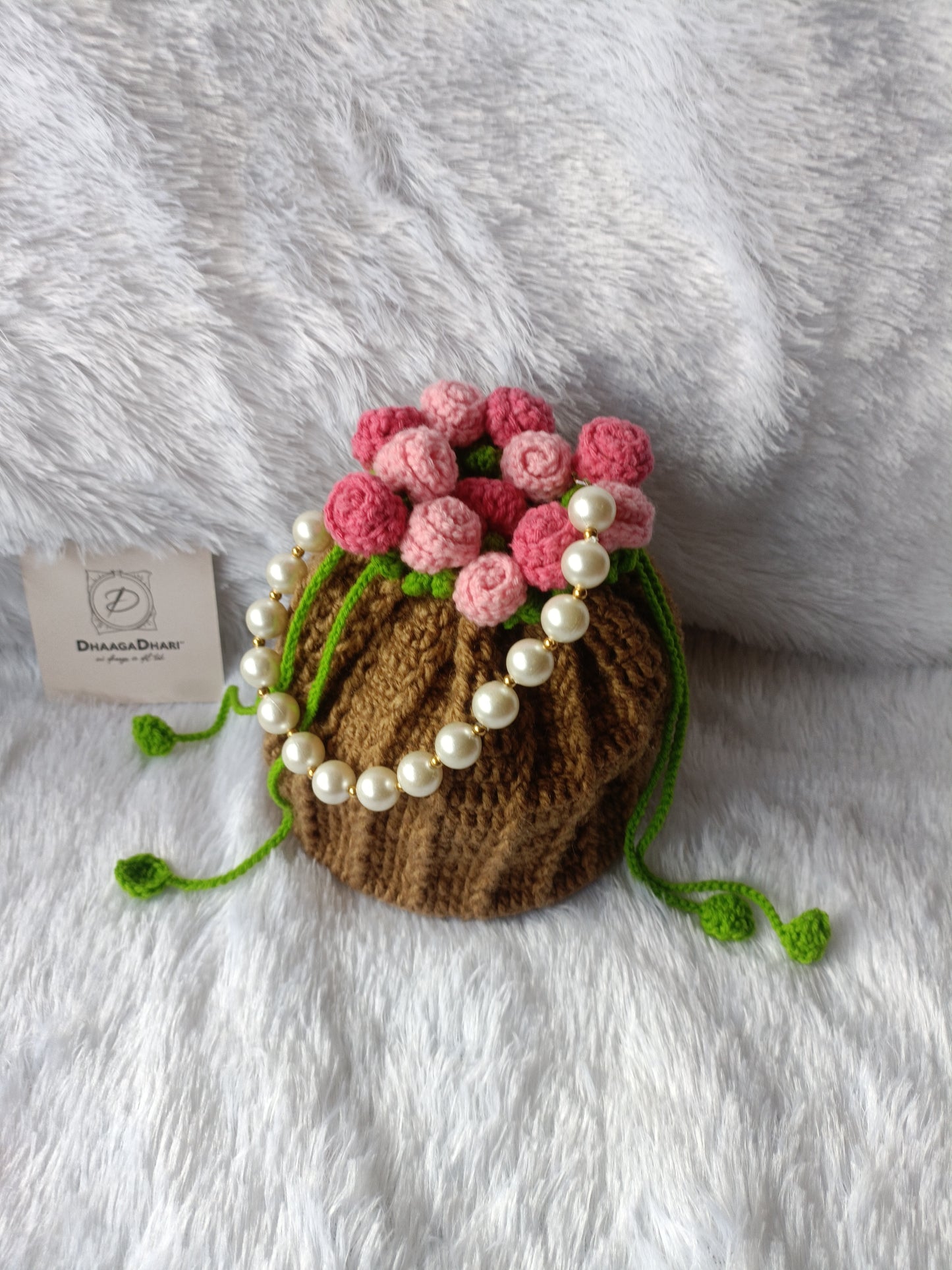 The ' Blooming Garden ' Crochet Potli