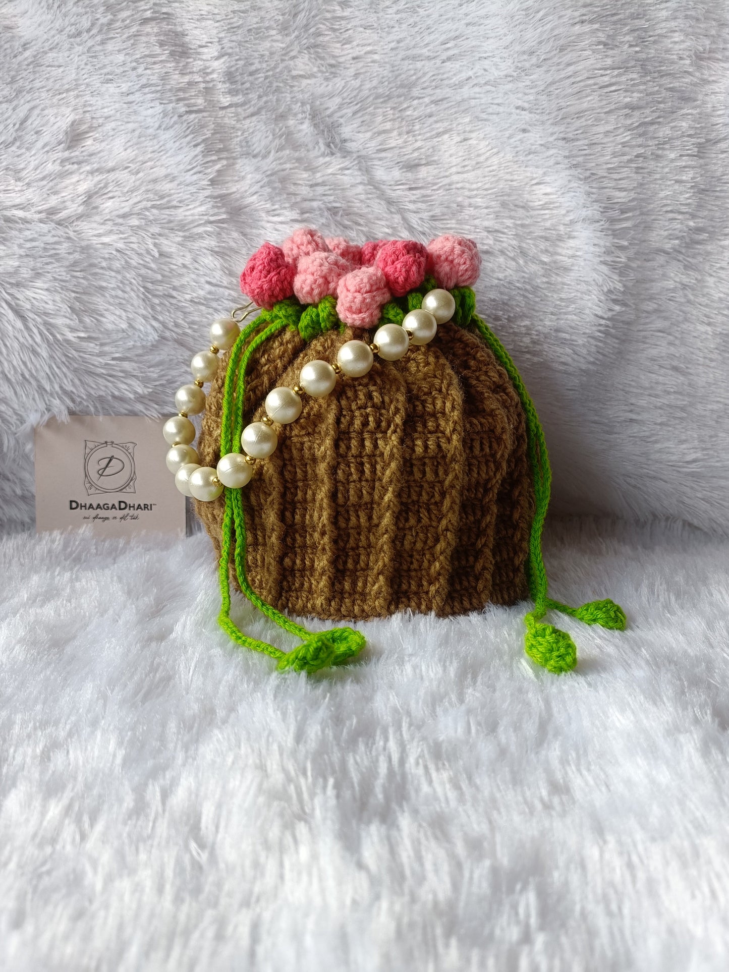The ' Blooming Garden ' Crochet Potli